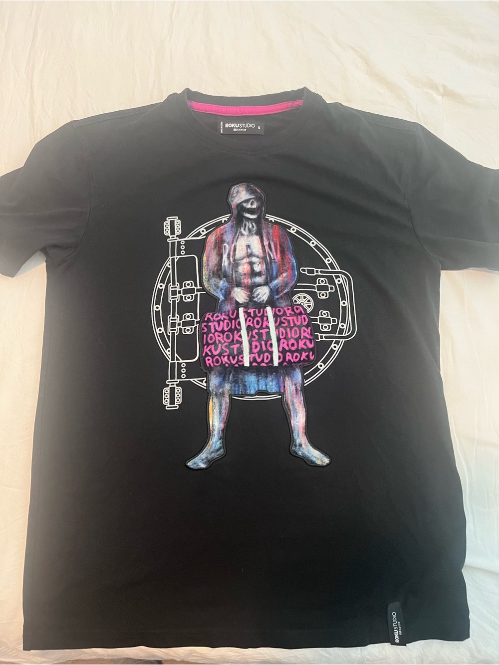 Roku Studio Black Graphic Tee with Multicolor Figure